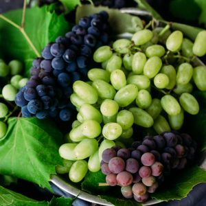 ripe-grapes-dark-background